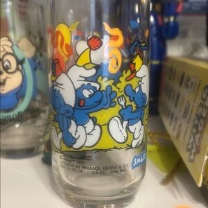 Peyo1983 licensed by Wallace Smurf collectors glass. In good condition.